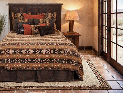 Hitchin' Post by Wooded River is a perfect example of warm toned Western bedding.
